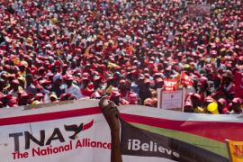 Uhuru Park in downtown Nairobi was a sea of red on Saturday as thousands of supporters of The National Alliance party gathered for the last rally before the general election.    