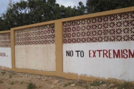 Libya is trying to fight a reputation of being fertile ground for al-Qaeda through signs like this painted outside a media centre [Getty]