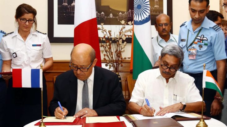 French Defence Minister signs a deal with his Indian counterpart to sell Rafale fighters jets to India