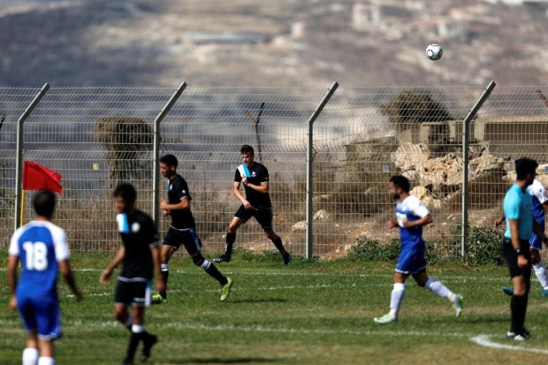 Players on a football field.