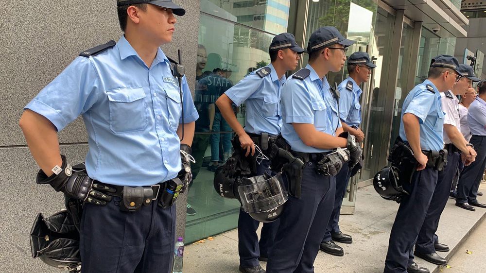 Hong Kong police were criticised for their heavy-handed response to last week’s protests but were subdued on Friday