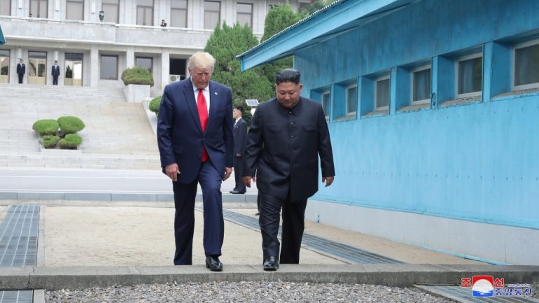 Donald Trump, then president of the US, meets Kim Jong Un at the Demilitarized Zone that separates thein June 2019