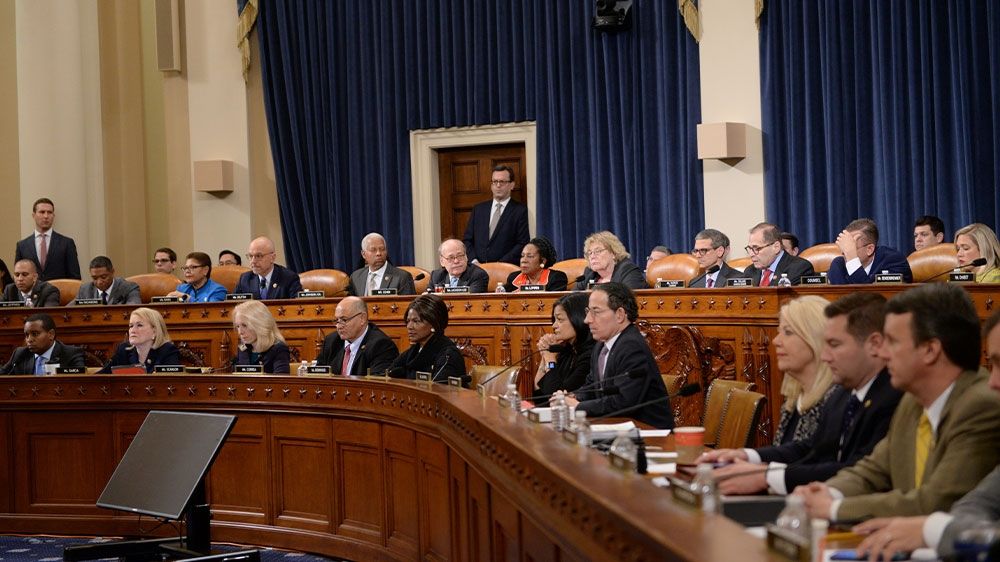 Members of the US House Judiciary Committee sitting during session approving two articles of impeachment against President Donald Trump on Capitol Hill in Washington, US