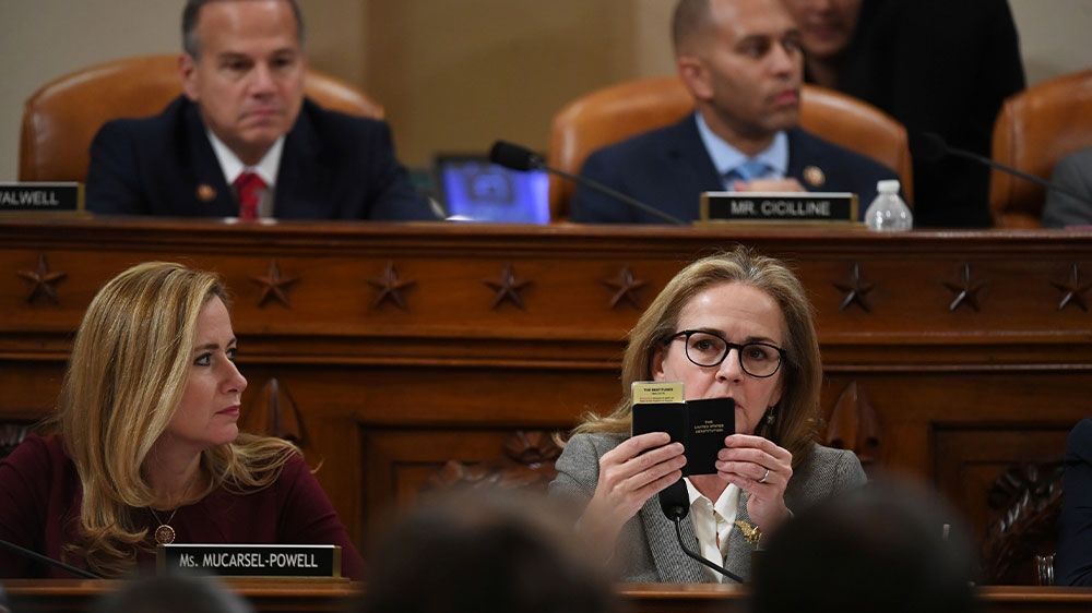 US Representative Madeleine Dean holds up a copy of the constitution during a House Judiciary Committee markup of articles of impeachment against President Donald Trump