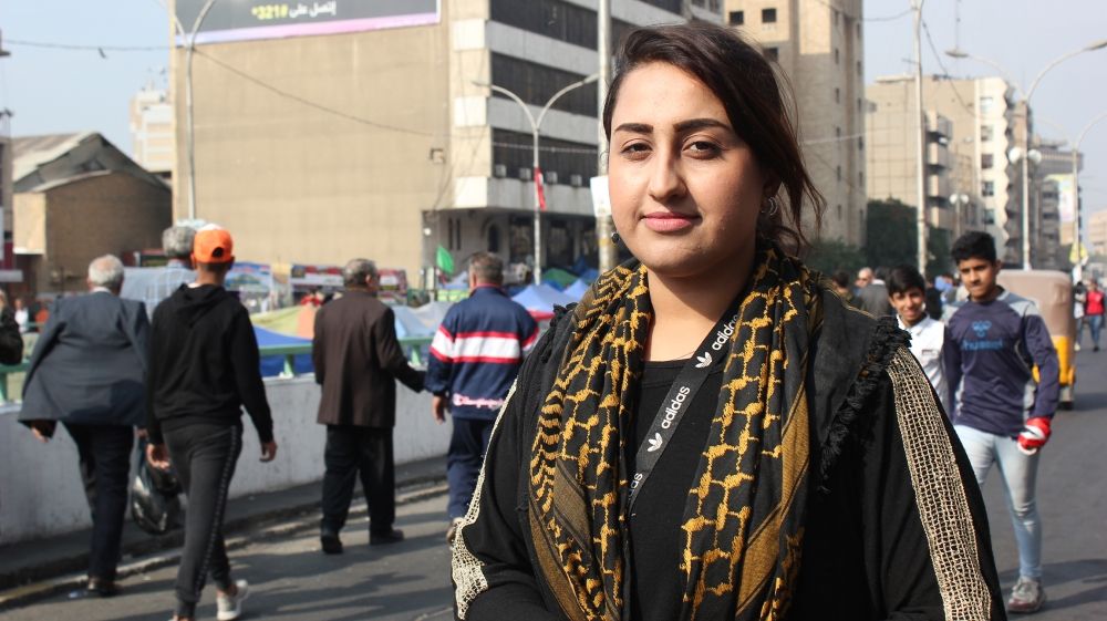Hawraa Aziz, 23, says she provides logistical support and treats wounded protesters