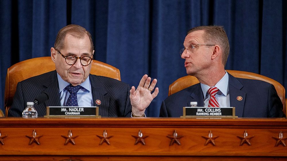 House Judiciary Committee Chairman Jerry Nadler (L), with House Judiciary Committee ranking member Doug Collins (R), delivers opening remarks during the House Judiciary Committee’s markup of articles of impeachment
