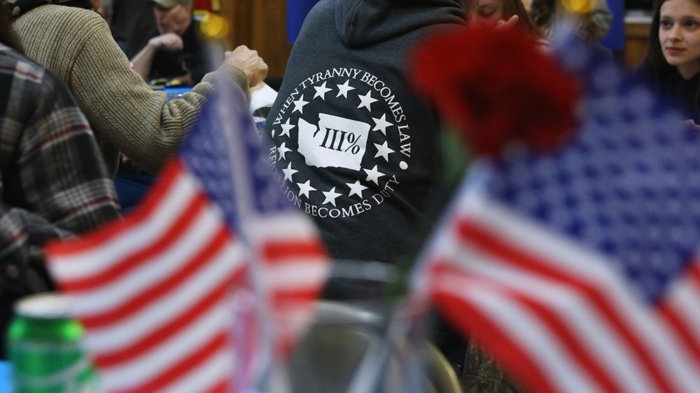 Gun rights advocates and militia members attend a pre-rally dinner in Richmond, Virginia