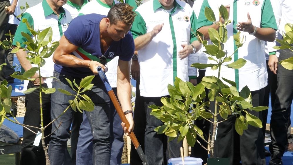 Cristiano Ronaldo joins a mangrove plantation event at Benoa Bay in Bali in 2013