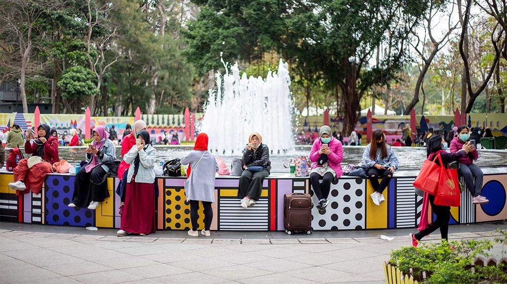 Hong Kong’s domestic workers get one day off a week and use the time to meet friends and relax away from the confines of the often tiny apartments where they are required to live with their employers