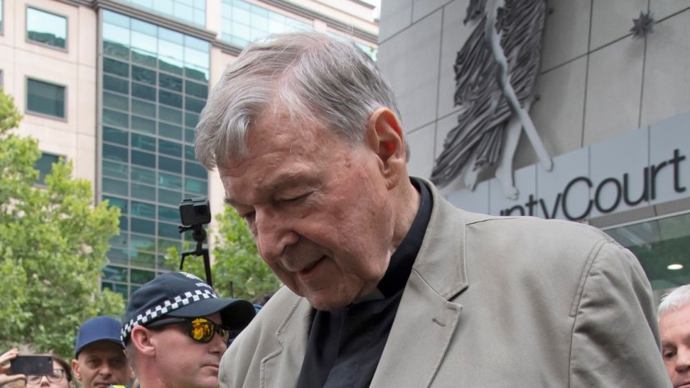 Pell leaves the County Court in Melbourne last February after he was found guilty of child sex abuse. The convictions were overturned on Tuesday