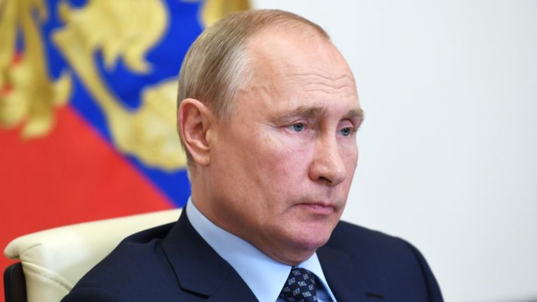 Russian President Putin delivers a televised address to the nation about the coronavirus disease outbreak, outside Moscow