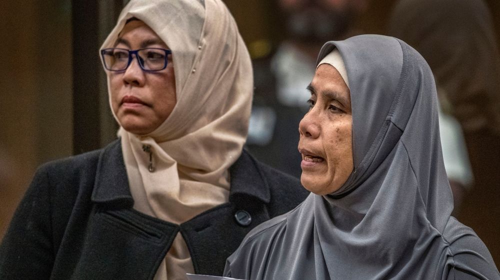Noraini Milne, right, mother of 14-year-old mosque shooting victim, Sayyad, said she planned to spend her life helping others