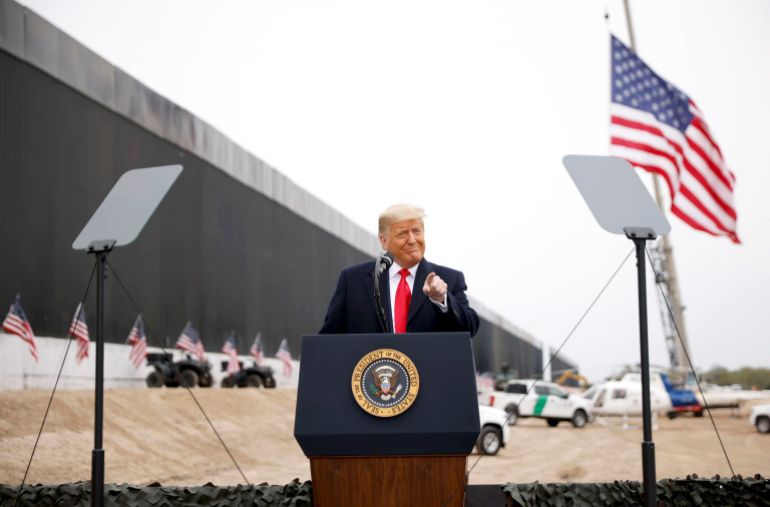 US President Donald Trump speaks during a visit at the US-Mexico border wall, in Alamo, Texas