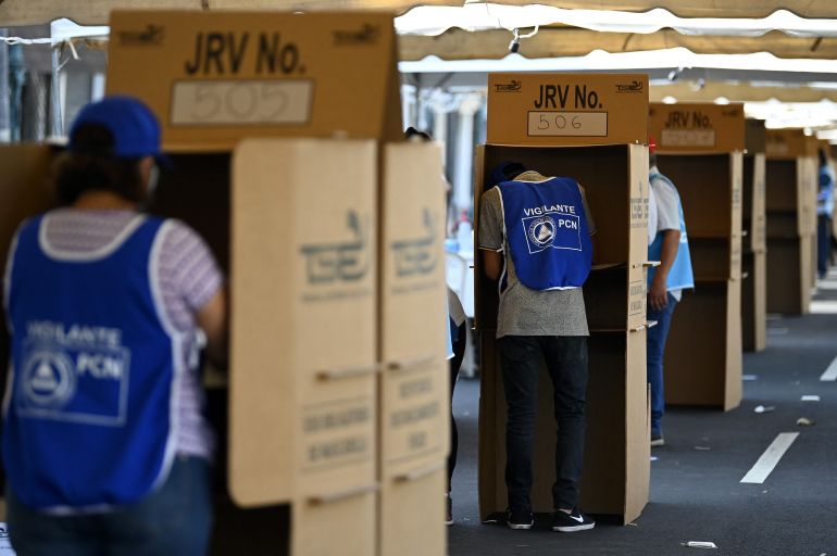 People vote during parliamentary and local elections in San Salvador on February 28