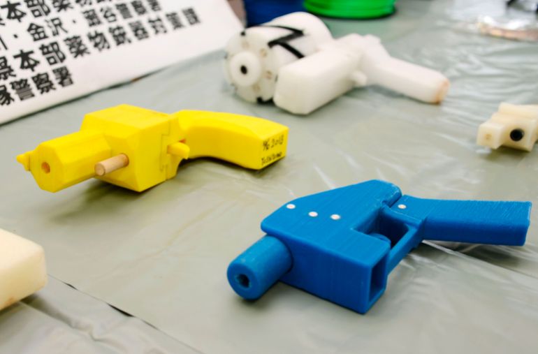 Seized plastic handguns which were created using 3D printing technology are displayed at Kanagawa police station in Yokohama, south of Tokyo, in this photo taken by Kyodo on May 8, 2014