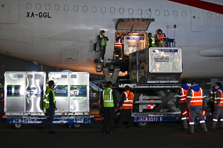 The first doses of AstraZeneca’s coronavirus vaccine provided by the US government arriving at Benito Juarez International airport in Mexico City, Mexico