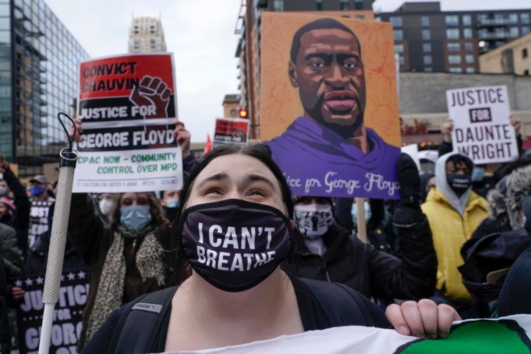 Protesters rally outside Minneapolis’s 3rd Precinct on April 19, 2021 as the murder trial against Derek Chauvin advances to jury deliberations