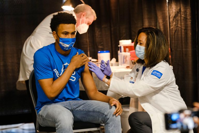 A group of teenagers serving as ‘COVID-19 Student Ambassadors’ joined Governor Gretchen Whitmer to receive a dose of the Pfizer coronavirus vaccine to promote and encourage Michigan residents to go and get their vaccines in Detroit, Michigan, the US