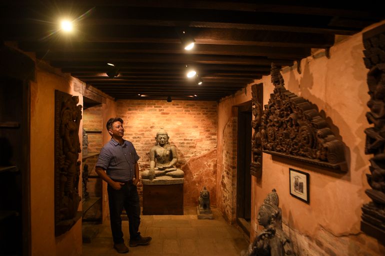 Puri standing during an interview with AFP at his house, in Bhaktapur near Kathmandu