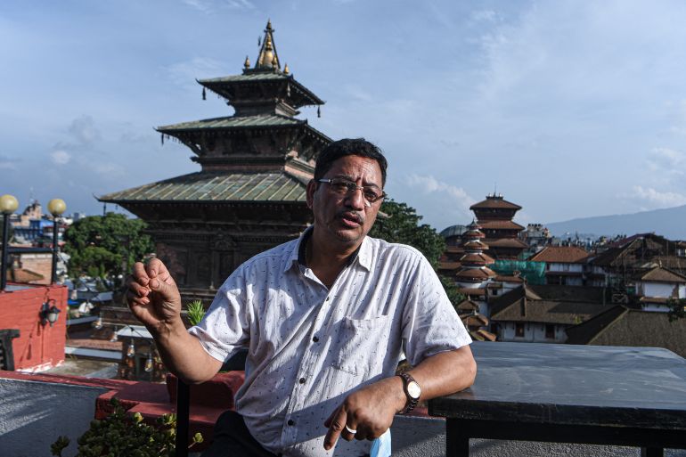 Priest of the Taleju Temple, Udhav Kamacharya, gesturing during an interview with AFP in Kathmandu