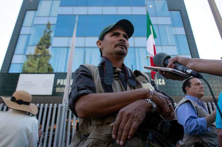Mexican photojournalist Margarito Martinez is interviewed as journalists from Baja California State demonstrate against violence towards members of the press in Mexico.