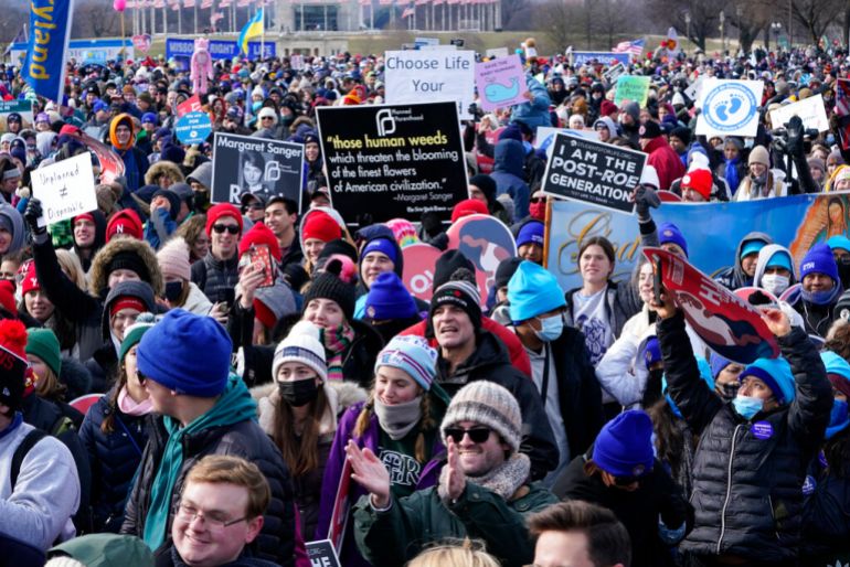 People attend the March for Life rally on the National Mall in Washington, DC, January 21, 2022