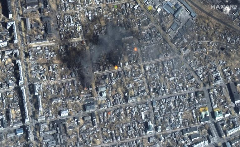 A satellite image shows a color infrared view of fires burning near Fontanna street, in eastern Mariupol, Ukraine, March 14, 2022. Picture taken March 14, 2022. Satellite image ©2022 Maxar 