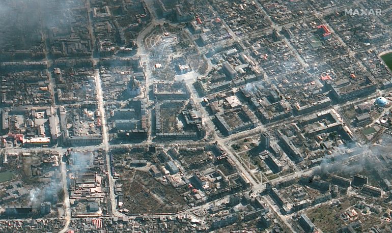 A satellite image shows an overview of a Mariupol burning building and the Mariupol theatre, Ukraine, March 21, 2022