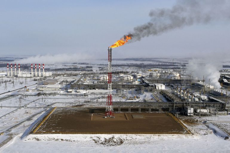 A flame burns from a tower at Vankorskoye oil field owned by Rosneft company north of the Russian Siberian city of Krasnoyarsk