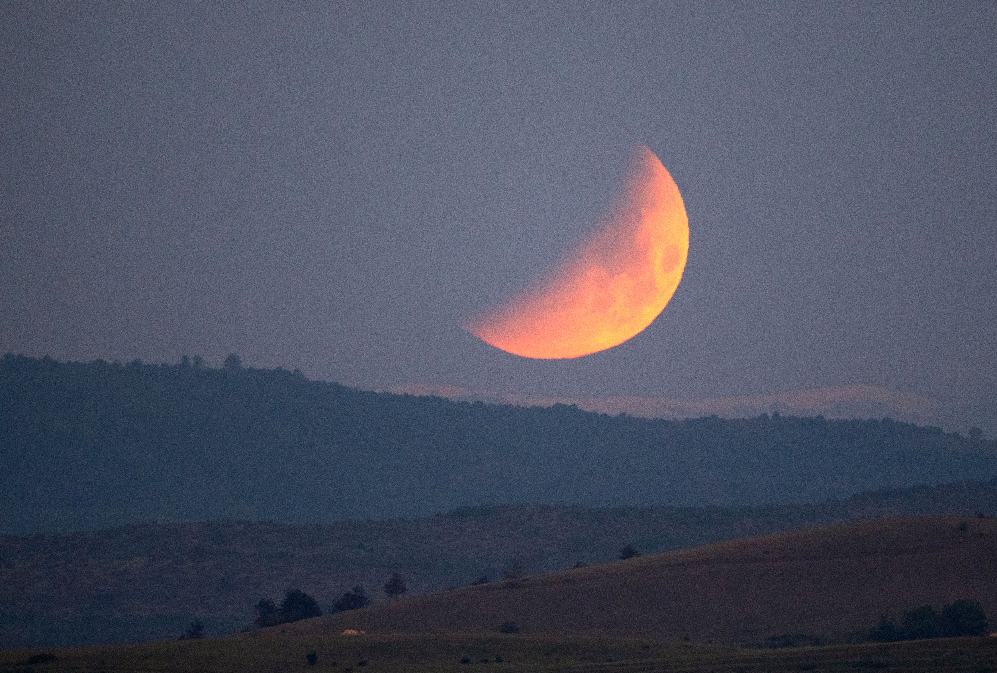 The Super Flower Blood Moon seen in the sky during the lunar eclipse over Skopje, Republic of North Macedonia
