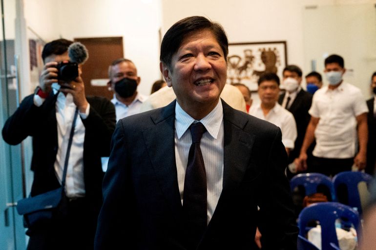 Philippine President Ferdinand "Bongbong" Marcos Jr, son of late dictator Ferdinand Marcos, arrives at his headquarters in Mandaluyong City, Metro Manila