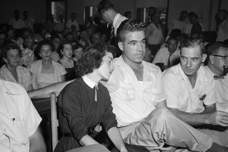 Carolyn Bryant rests her head on her husband Roy Bryant's shoulde