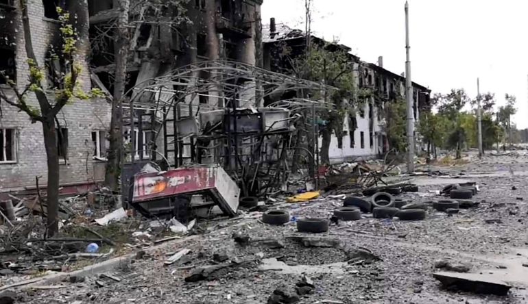 A photo provided by the Luhansk region military administration shows damaged residential buildings in Lysychansk
