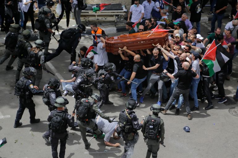 Israeli forces attacked Abu Akleh’s funeral and beat mourners and pallbearers carrying her coffin