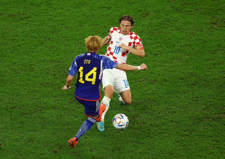 Croatia’s Luka Modric in action with Japan’s Junya Ito at Al Janoub Stadium, Al Wakrah, Qatar, on December 5, 2022