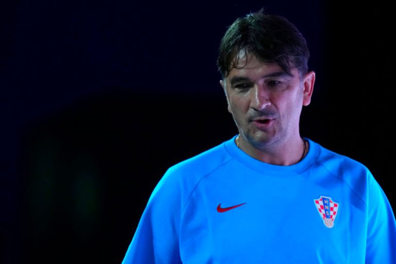 Croatia’s head coach Zlatko Dalic arrives for a press conference on December 12, 2022, the eve of the World Cup semifinal match between Croatia and Argentina