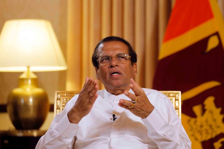 FILE- Sri Lankan President Maithripala Sirisena speaks during an interview with the Associated Press at his residence in Colombo, Sri Lanka, Tuesday, May 7, 2019. A Sri Lankan court has on Friday, Sept. 16, 2022, issued a summons ordering the ex-president to appear in a case alleging he failed to prevent suicide bomb attacks in 2019 that killed nearly 270 people. (AP Photo/Eranga Jayawardena)