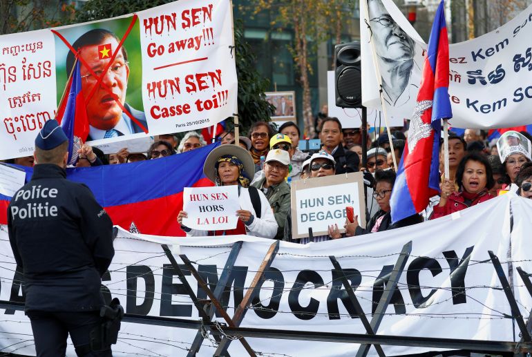 Protesters chant slogans against Cambodia’s Prime Minister Hun Sen during the EU-Asia leaders summit in Brussels, Belgium in 2018