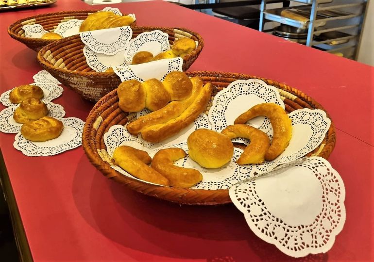 Three baskets with bread Almatrooshi made in various shapes