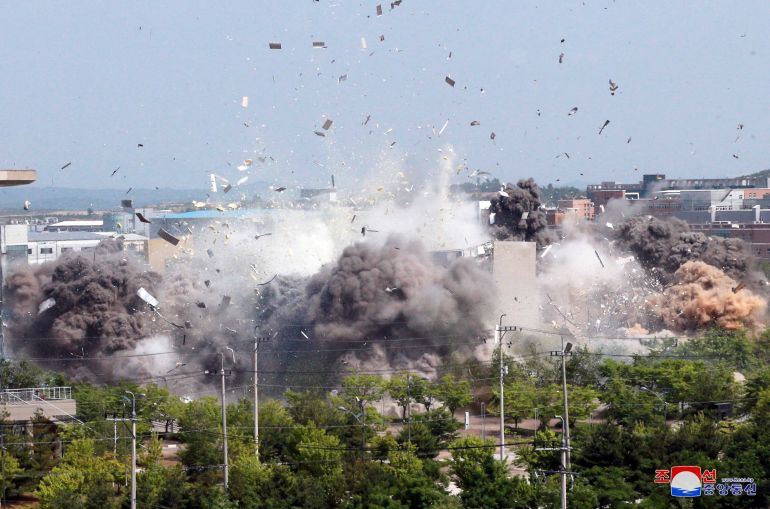 An explosion destroys a liaison office built by South Korea in the border town of Kaesong, North Korea, on June 16, 2020 [North Korea’s Korean Central News Agency via Reuters]