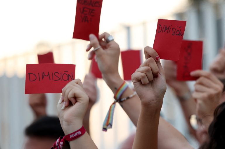 People protest outside the Spanish Soccer Federation