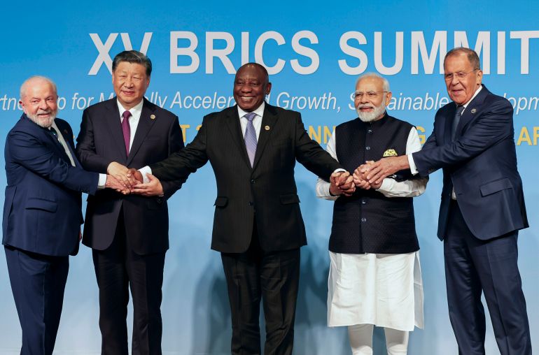 From left, Brazil’s President Luiz Inacio Lula da Silva, China’s President Xi Jinping, South Africa’s President Cyril Ramaphosa, India’s Prime Minister Narendra Modi and Russia’s Foreign Minister Sergey Lavrov pose for a BRICS group photo