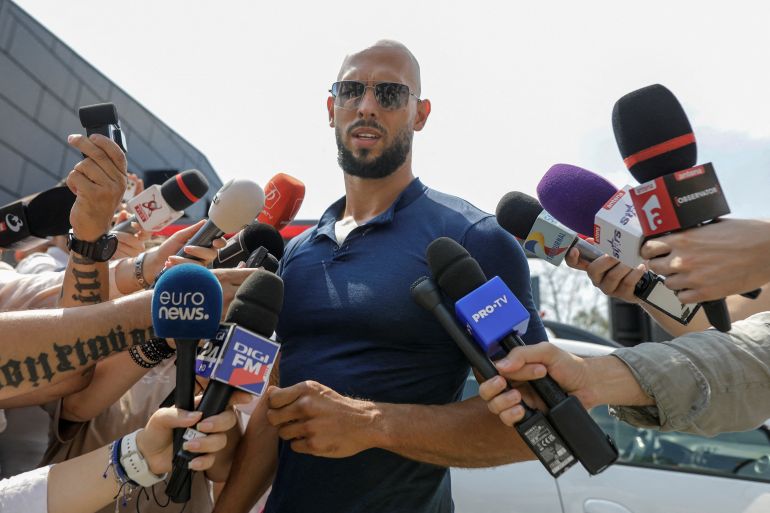 Andrew Tate delivers a press statement outside his house in Voluntari, Ilfov, Romania, August 4, 2023