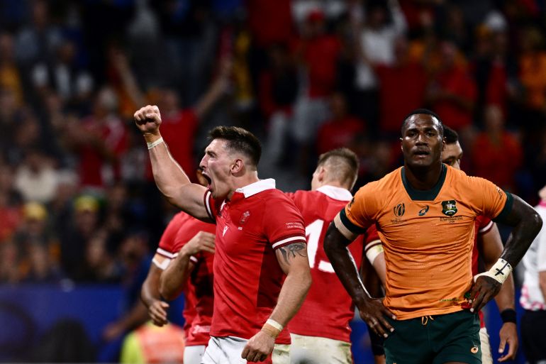 Wales left wing Josh Adams punching the air with delight after Wales' record win over Australia in rugby