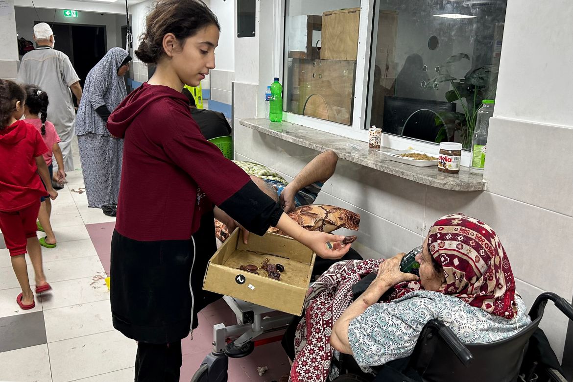 Patients and internally displaced people are pictured at Al-Shifa hospital in Gaza City on November 10