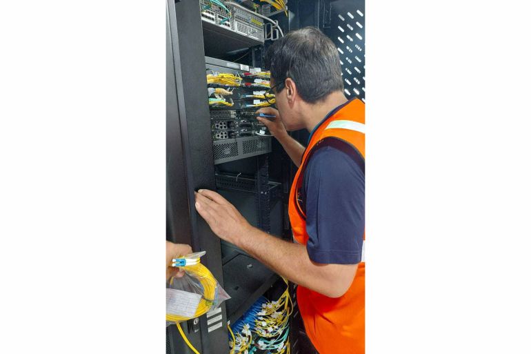 An engineer working on the Sheikh Radwan data centre in Gaza City two weeks ago [Courtesy of PalTel]