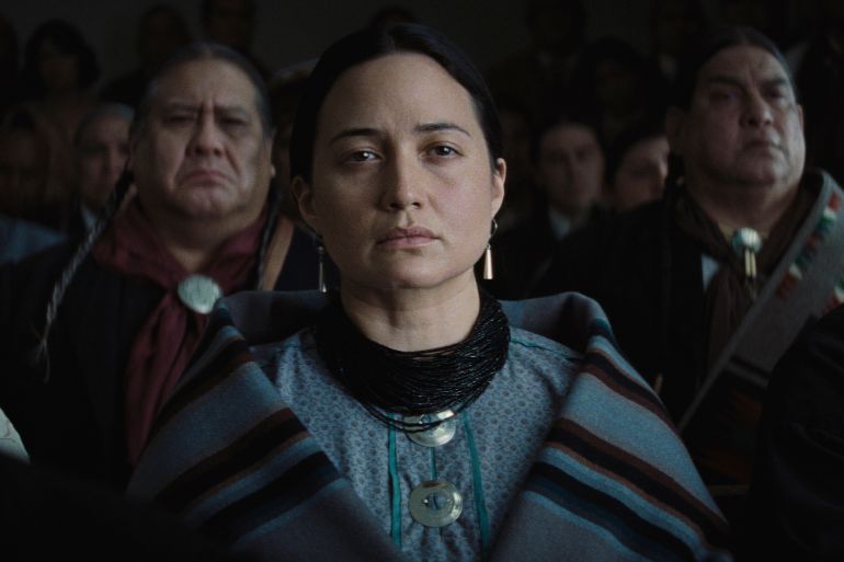 Lily Gladstone, centre, in a scene from Killers of the Flower Moon [Apple TV+ via AP]