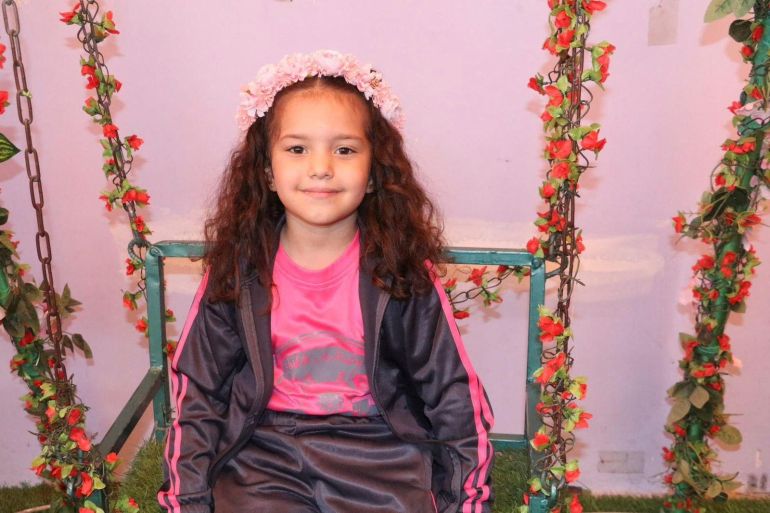Palestinian girl Hind Rajab poses for a photograph, in this undated handout picture
