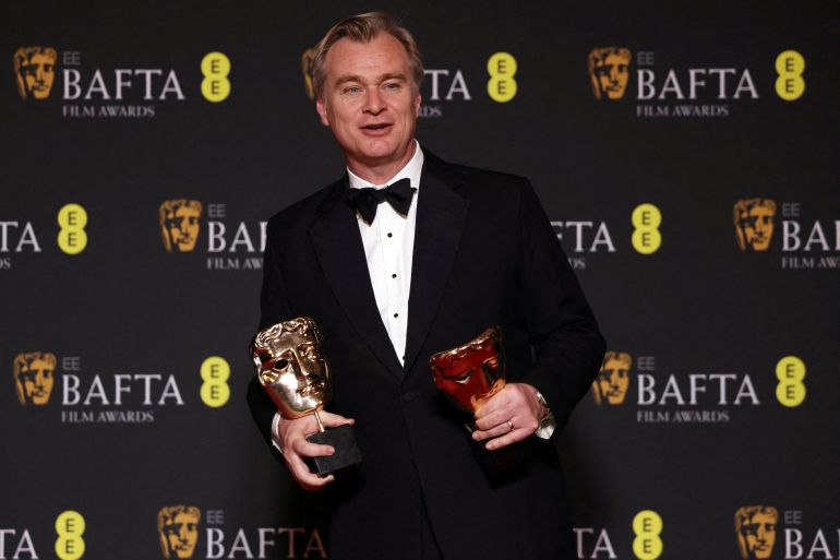 Christopher Nolan, winner of the awards for Director and Best Film for "Oppenheimer", poses in the winners' room during the 2024 British Academy of Film and Television Awards (BAFTA) at the Royal Festival Hall in the Southbank Centre, London.