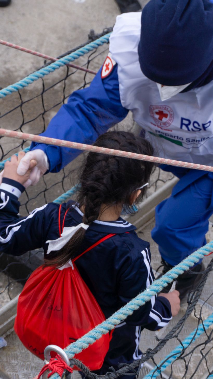 Other children leaving the vessel. [Nora Adin Fares/Al Jazeera]
